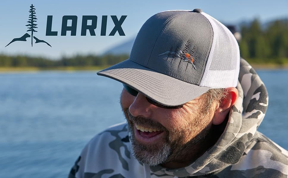 Co-Founder Zac Reid wearing a Larix Hat while fishing.